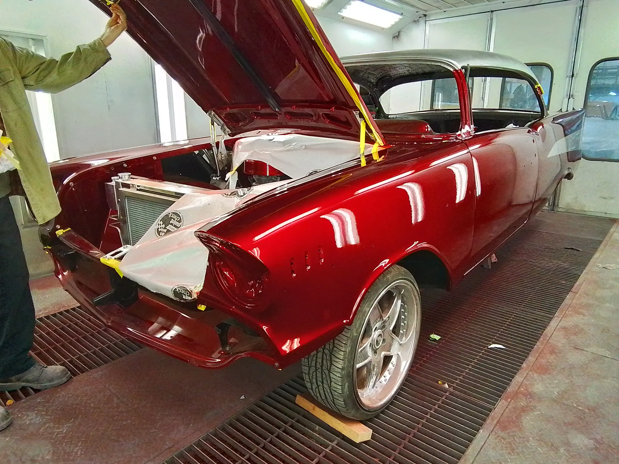 Red Chevrolet during the paint and restoration process